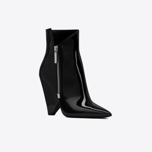 SAINT LAURENT | WEDGE BOOTIES IN PATENT LEATHER
